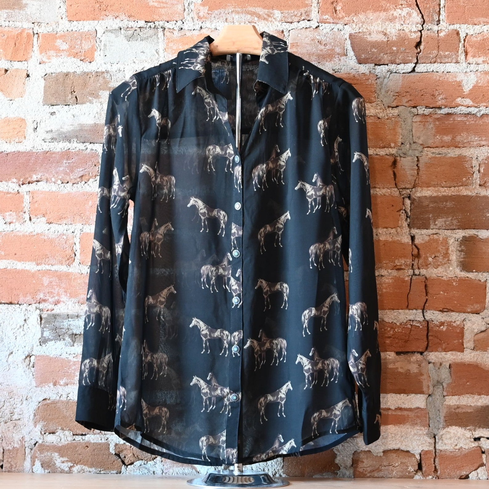 Black Brooks Shirt by Tasha Polizzi with horse print, pointed collar, and decorative button details