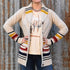 View of Pendleton lambswool cardigan with yellow, red, and black stripes and shawl collar