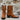 View of Stallion Ladies 10" cognac suede boot with floral tooled leather top and rounded toe