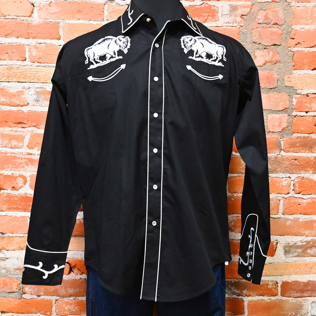 View of Black Western shirt with white embroidered bison motif across yokes