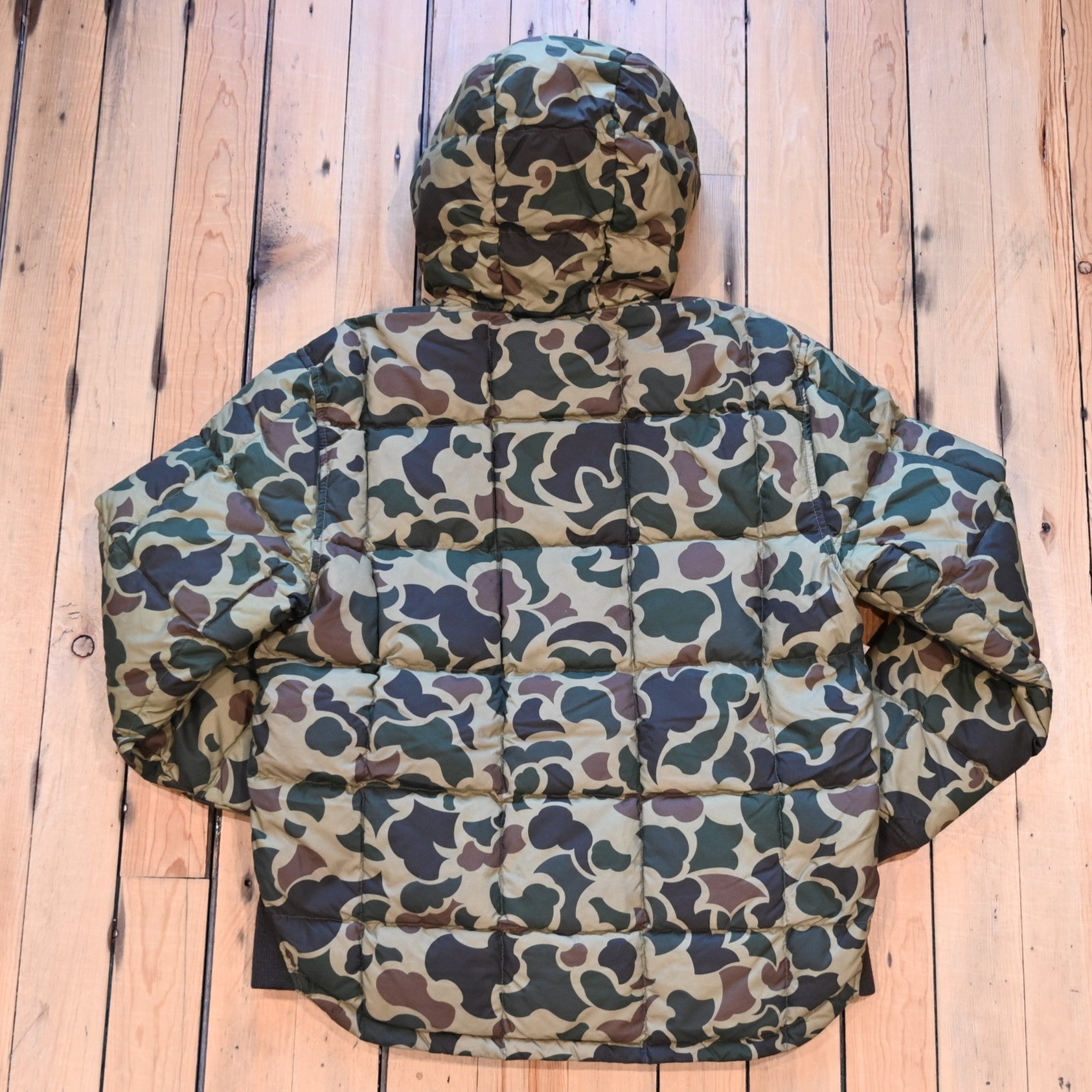Filson Waxed Down Jacket in Tundra Shrub Camo with hood, waxed shell, and insulated down fill