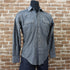 View of Rockmount black chambray western shirt with sawtooth pockets and gold diamond snaps