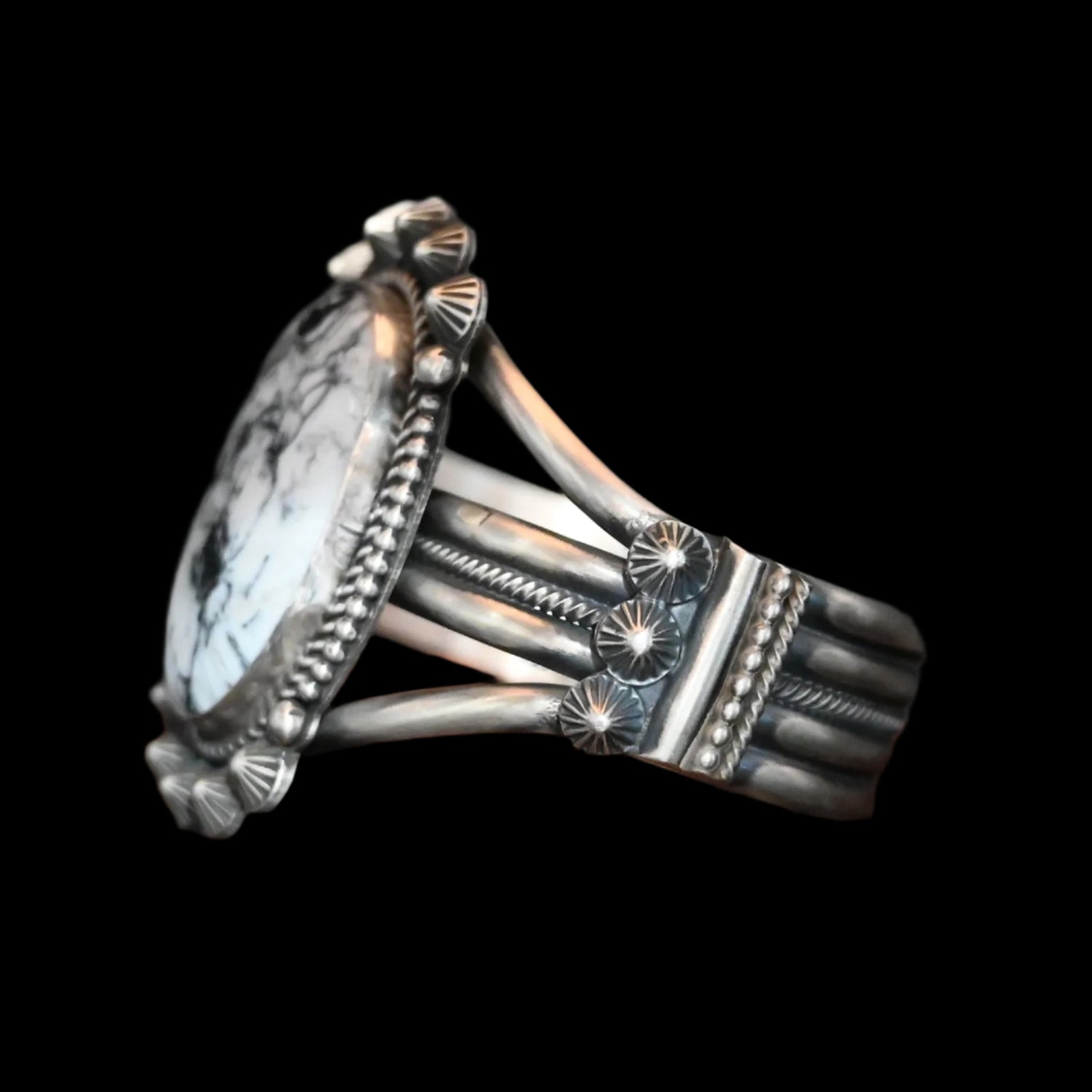 View of Sunwest Silver Michael Calladitto White Buffalo Cuff featuring a large White Buffalo stone with intricate sterling silver detailing