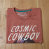 View of Sendero dusty mauve crop tee with cowboy floating in space and planets graphic
