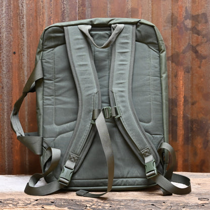 View of Filson Surveyor Pullman Pack in Service Green, showcasing its durable construction and spacious design