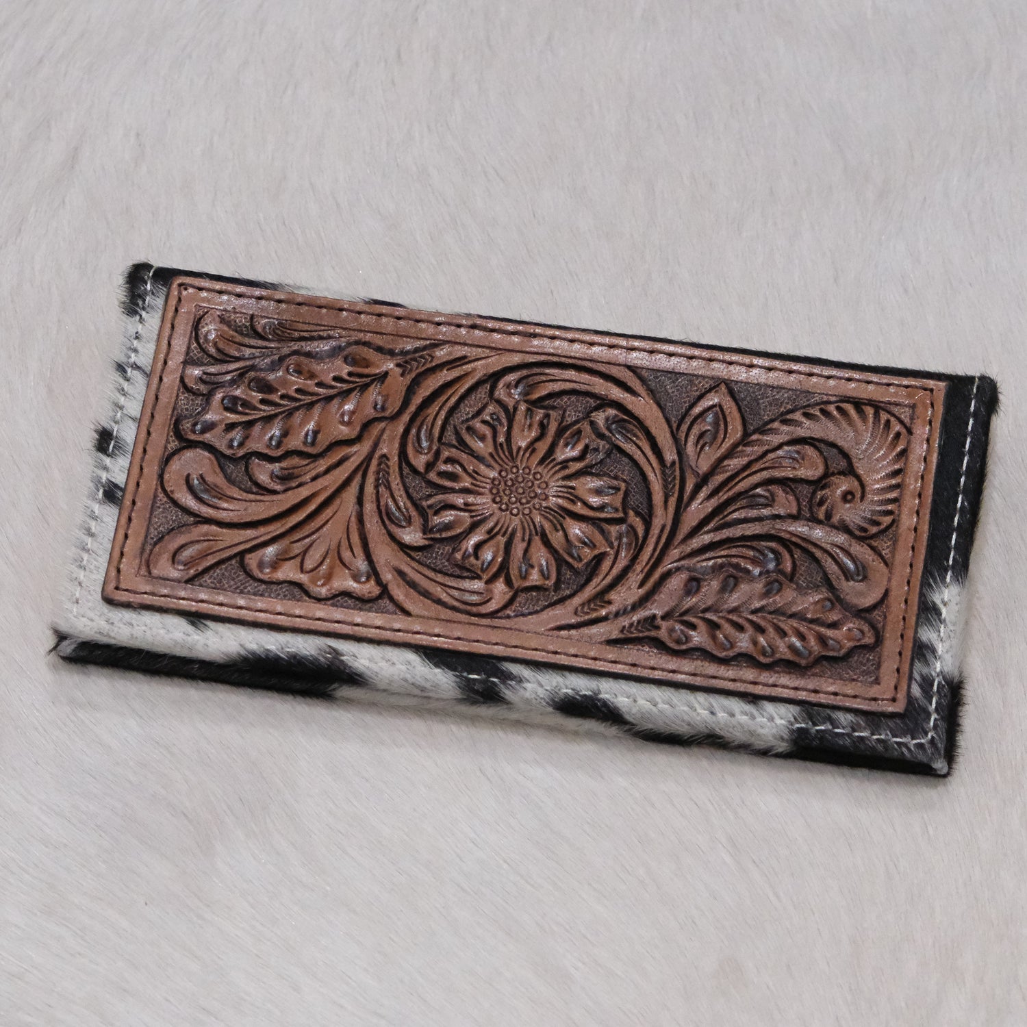 American Darling tooled leather checkbook wallet with hair-on hide and snap closure