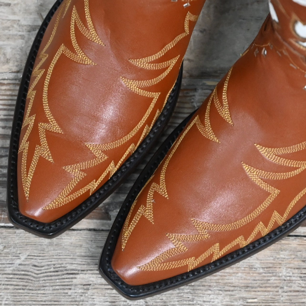 View of Stallion Ladies O.S. &quot;Bronco&quot; boots in cognac calf with bone, red, and green inlays