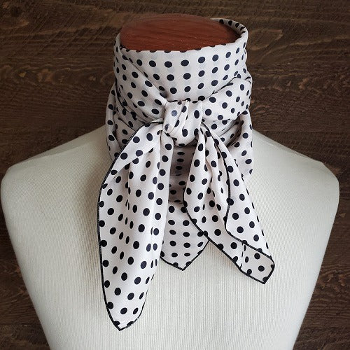 Cowboy Images 36x36 beige silk crepe de chine scarf with 3/16″ black dot pattern