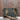 American Darling small canvas crossbody in forest green with tooled leather straps