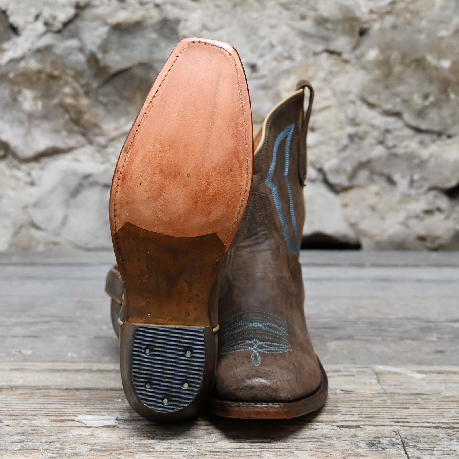 Rios of Mercedes ladies 8″ boot with chocolate-colored top, turquoise stitching, and cutter snip toe