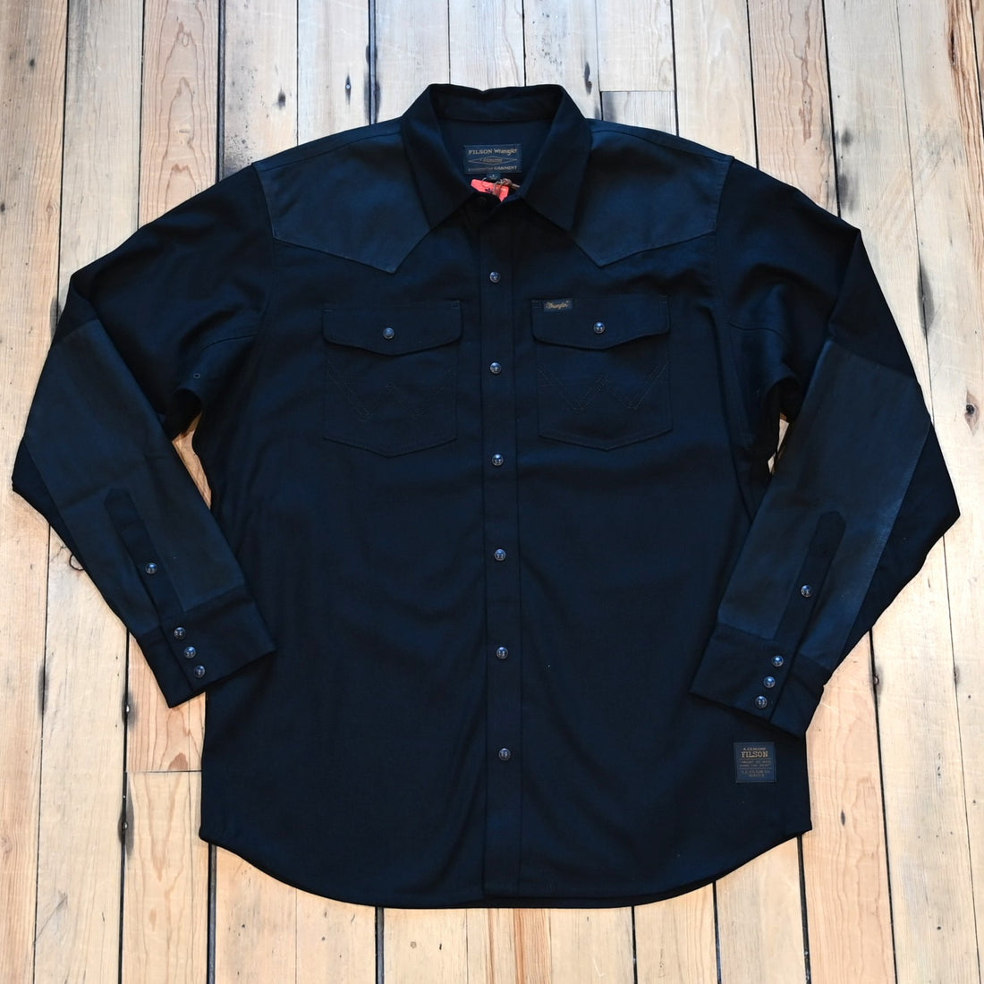 Filson × Wrangler Adventure Shirt in black with canvas overlays and snap pockets