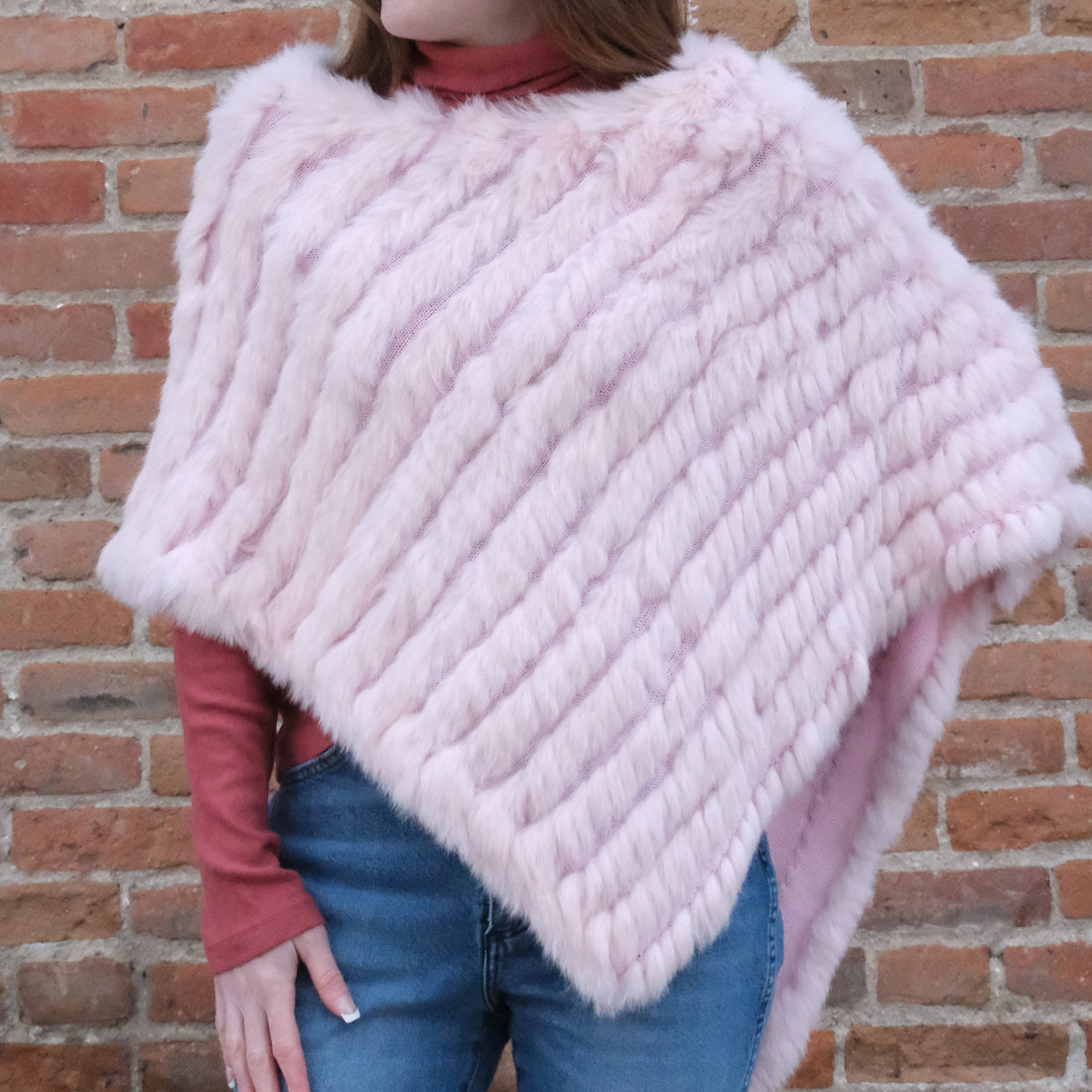 Morris Kaye baby pink knit rabbit fur poncho in shorter silhouette