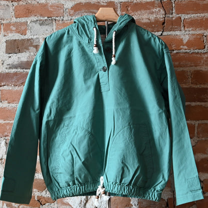View of Filson Ladies Ranger Hooded Popover in Deep Sea featuring adjustable hood, cuffs, and separated hand pockets
