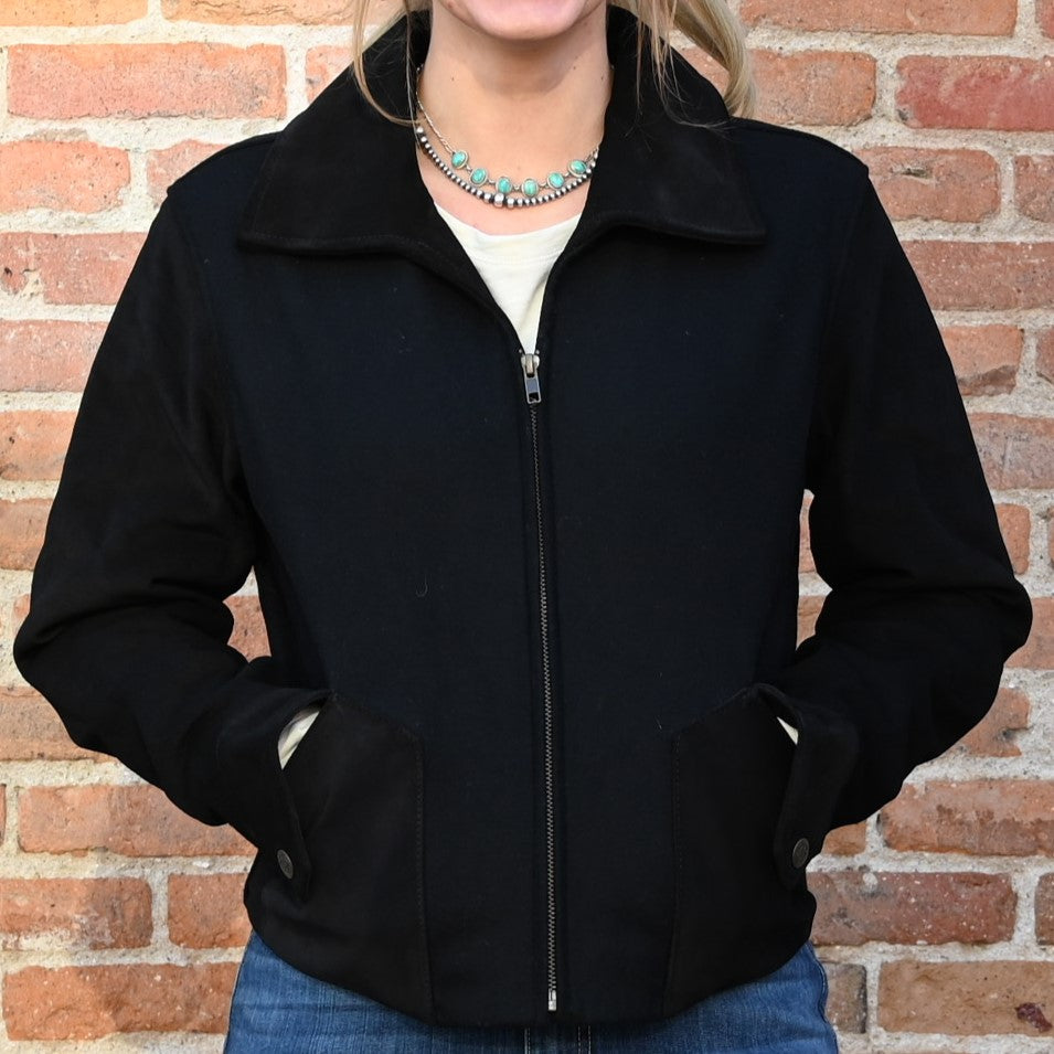 View of Black wool and suede Chimayo-style jacket by Schaefer with Western yoke and adjustable waist tabs