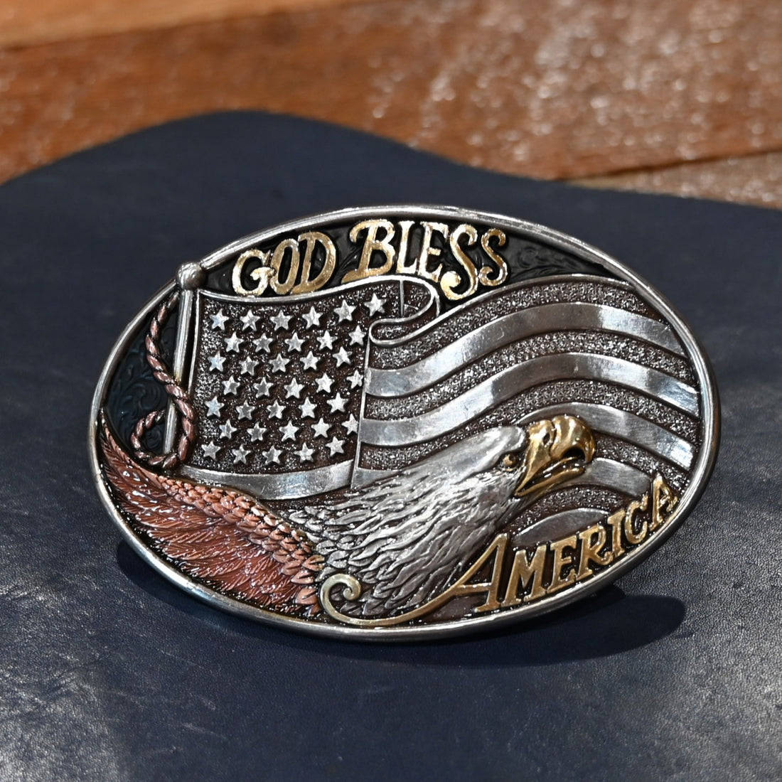 Nocona oval American flag and eagle buckle with bronze and gold accents