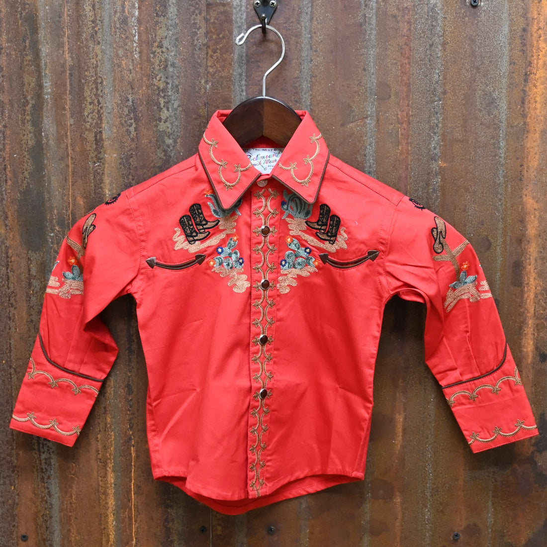 View of Red Rockmount kids western shirt with cactus and boot embroidery and Western piping