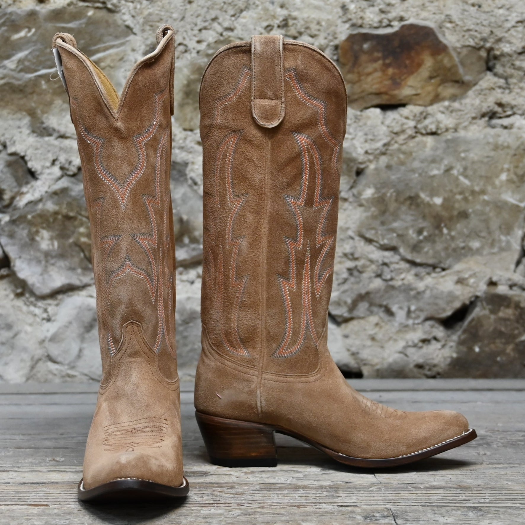 View of Macie Bean 15″ “Mind Your Own Biscuits” tobacco suede boot with almond toe and decorative stitch