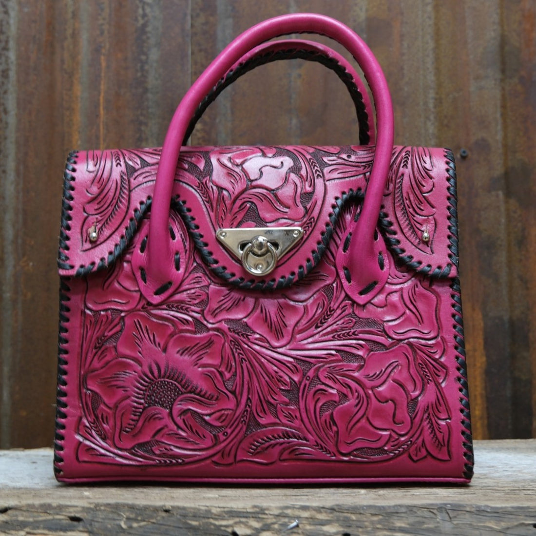 Que Chula fuchsia tooled leather purse with floral Western tooling and top handles