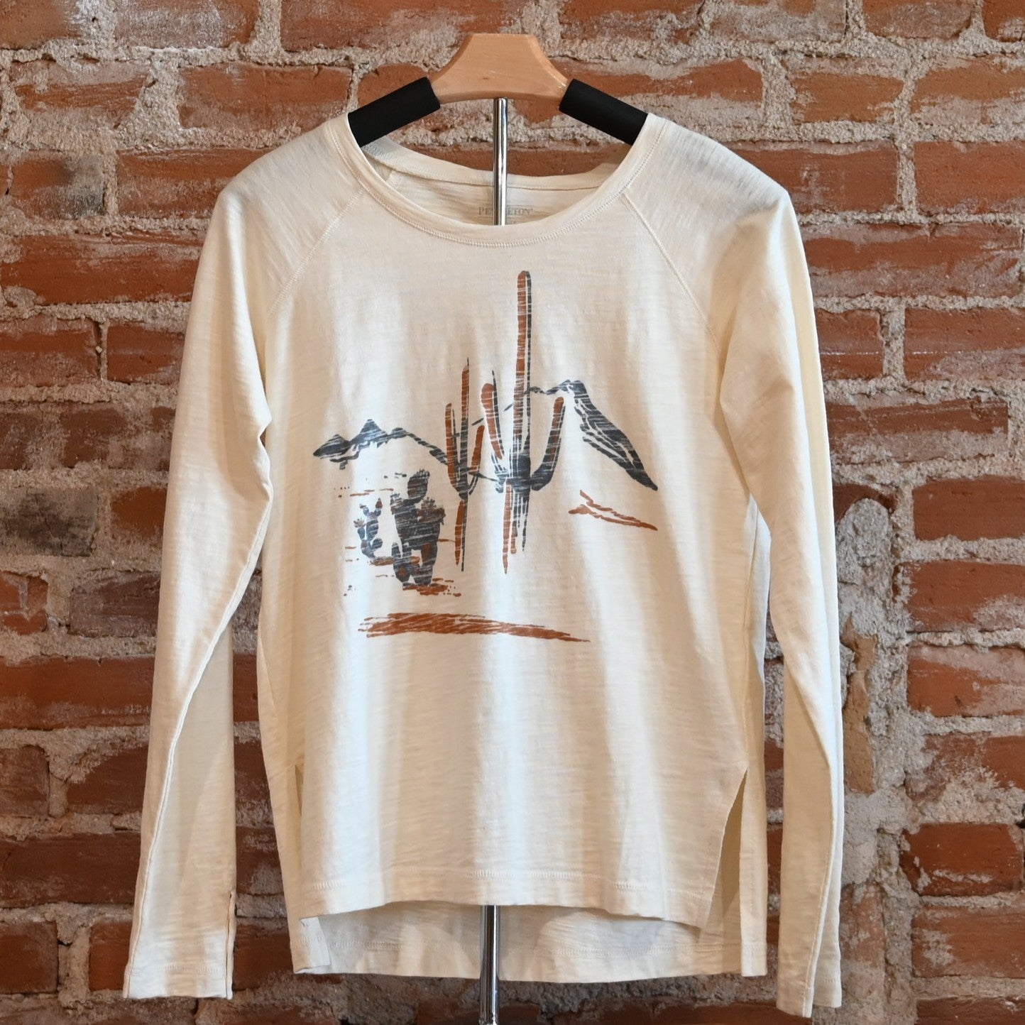 View of Pendleton long sleeve graphic tee in Antique White with front print