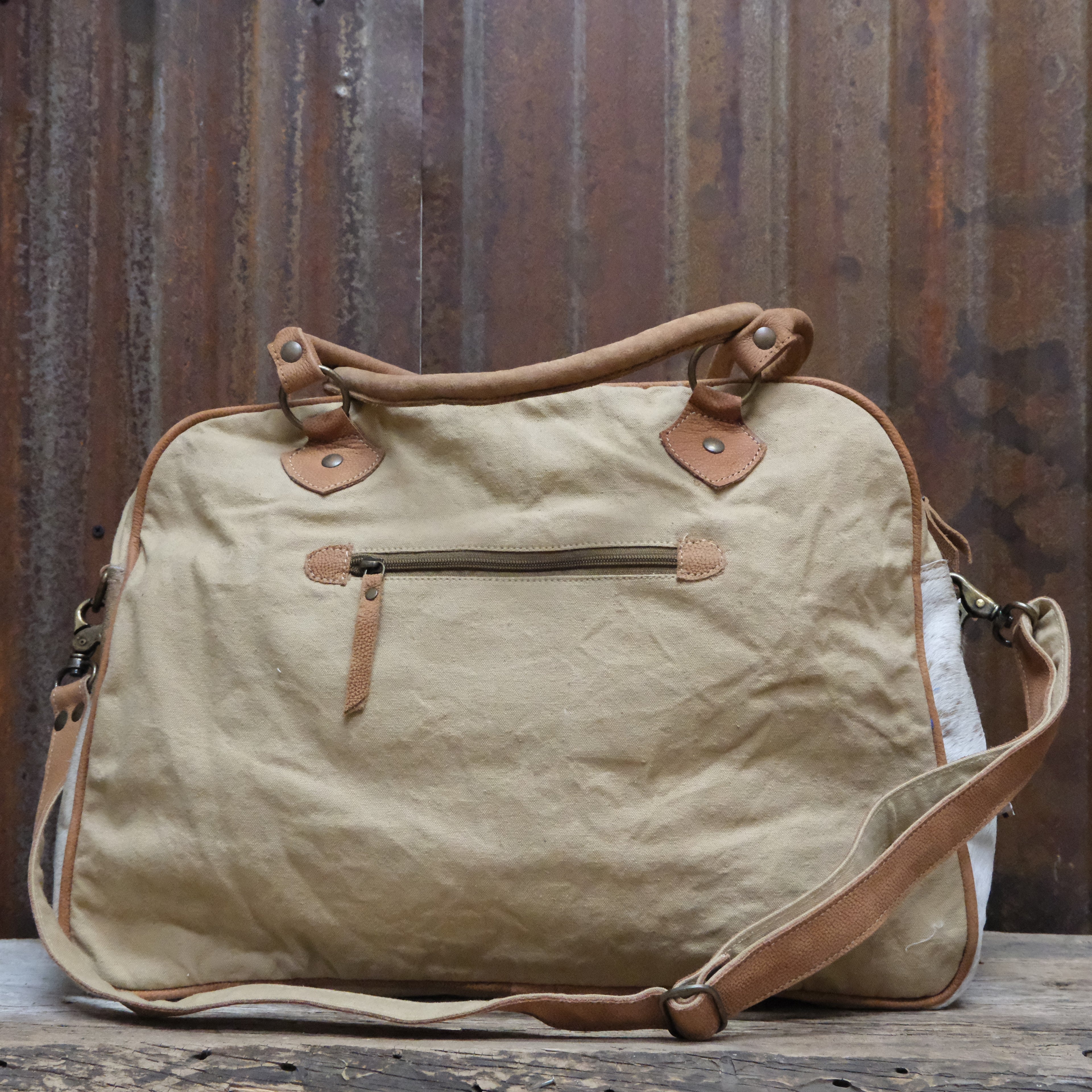 American Darling neutral geo canvas duffel bag with leather trim and geometric pattern