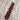 View of Rockmount burgundy silk necktie with roper figure and Tru‑West® branding