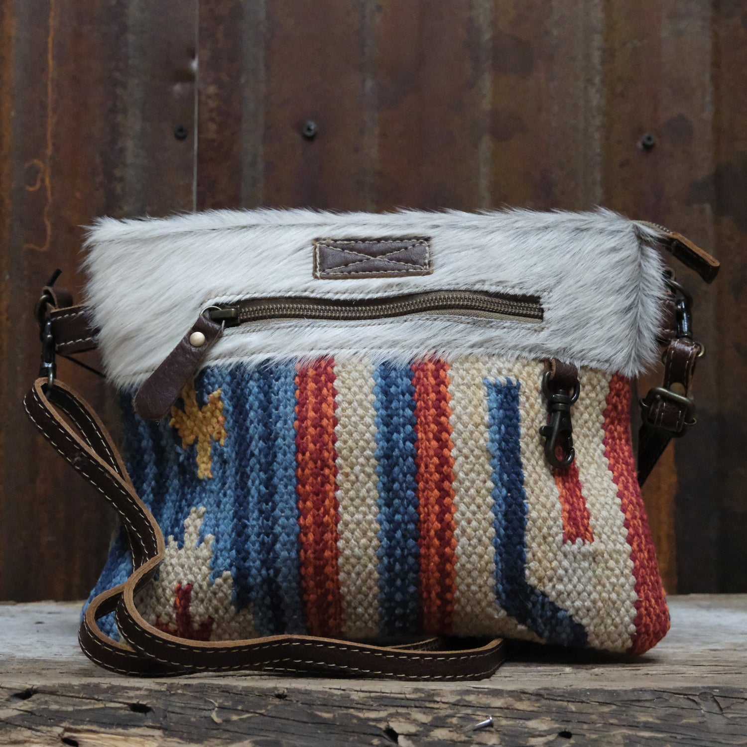 Myra Tropical printed canvas cross body bag with leather trim and zipper closure