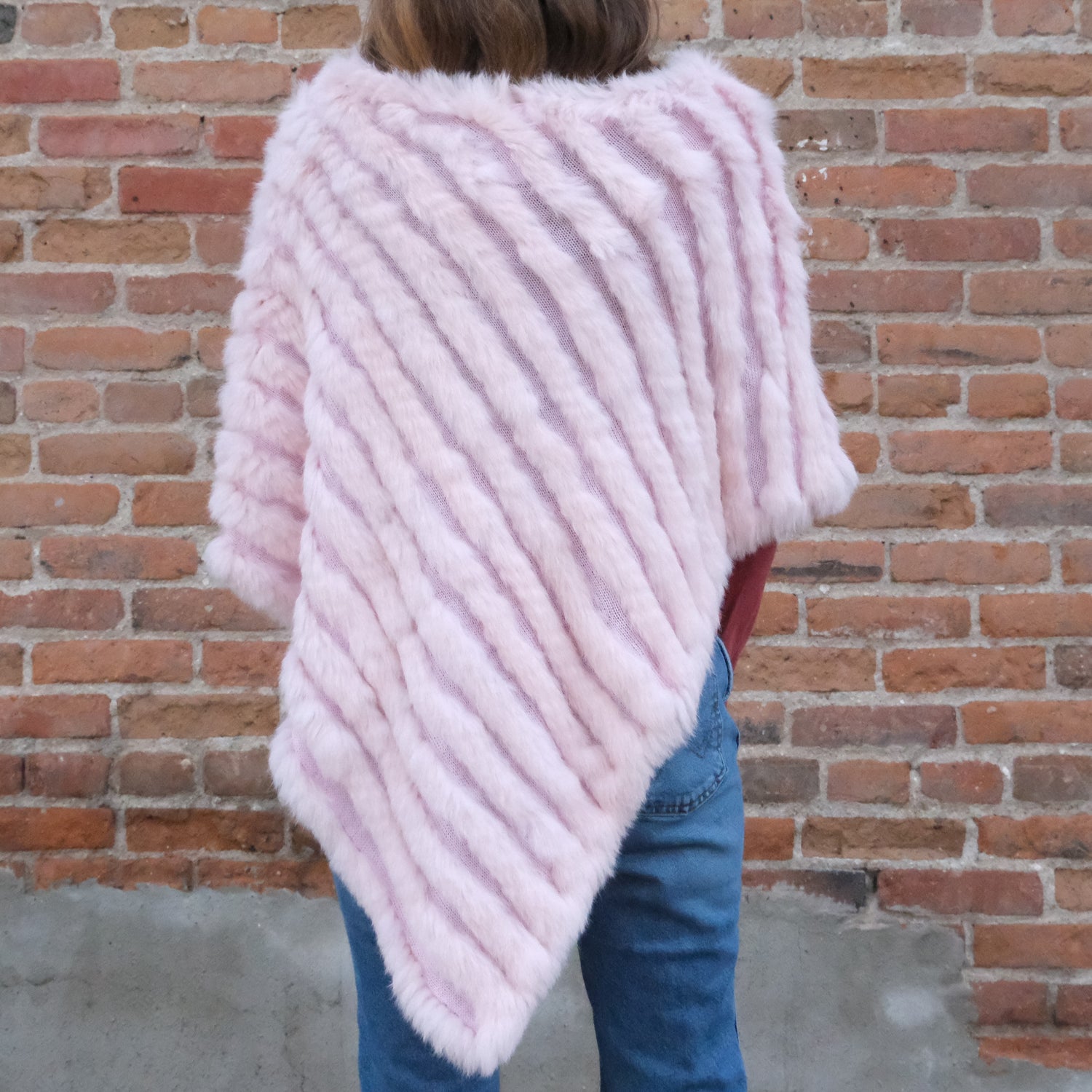 Morris Kaye baby pink knit rabbit fur poncho in shorter silhouette