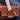 Que Chula El Guante honey tooled leather purse with glove style hand strap