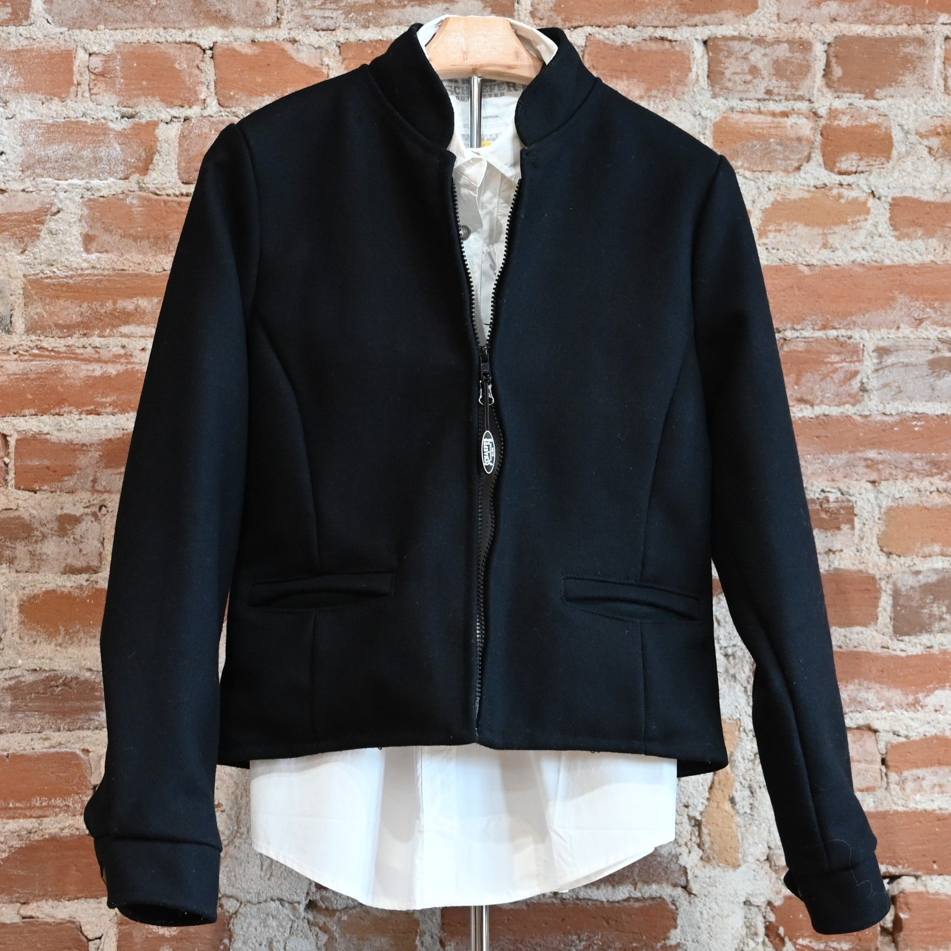 View of Schaefer ladies wool jacket in solid gray, red, or black with western yoke and zip front