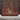 Myra floral print canvas circular wallet with leather trim and zipper closure