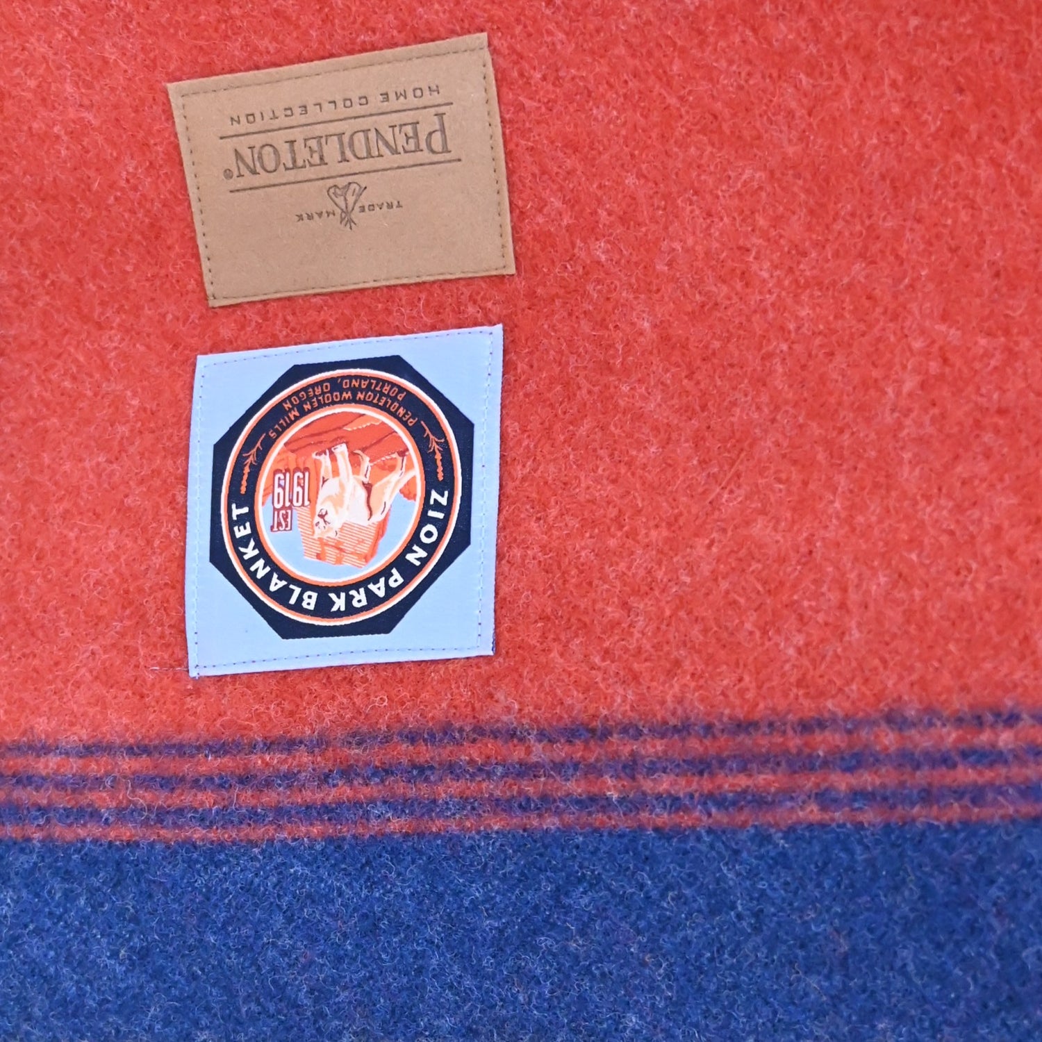 View of Pendleton Zion National Park Queen blanket in red with blue and gold jacquard bands