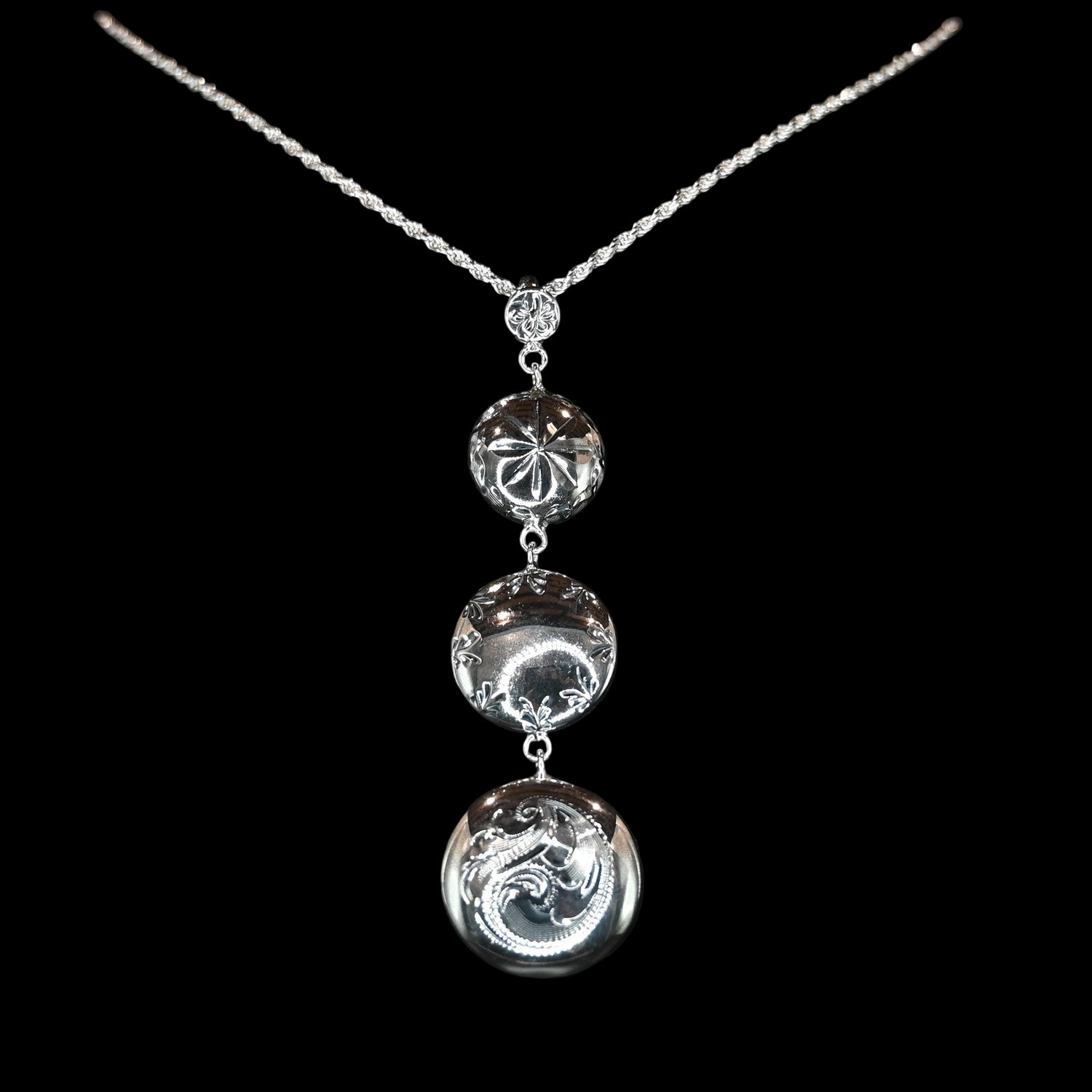 Vogt Silversmiths Kimberly Going Out pendant, sterling silver with three engraved conchos