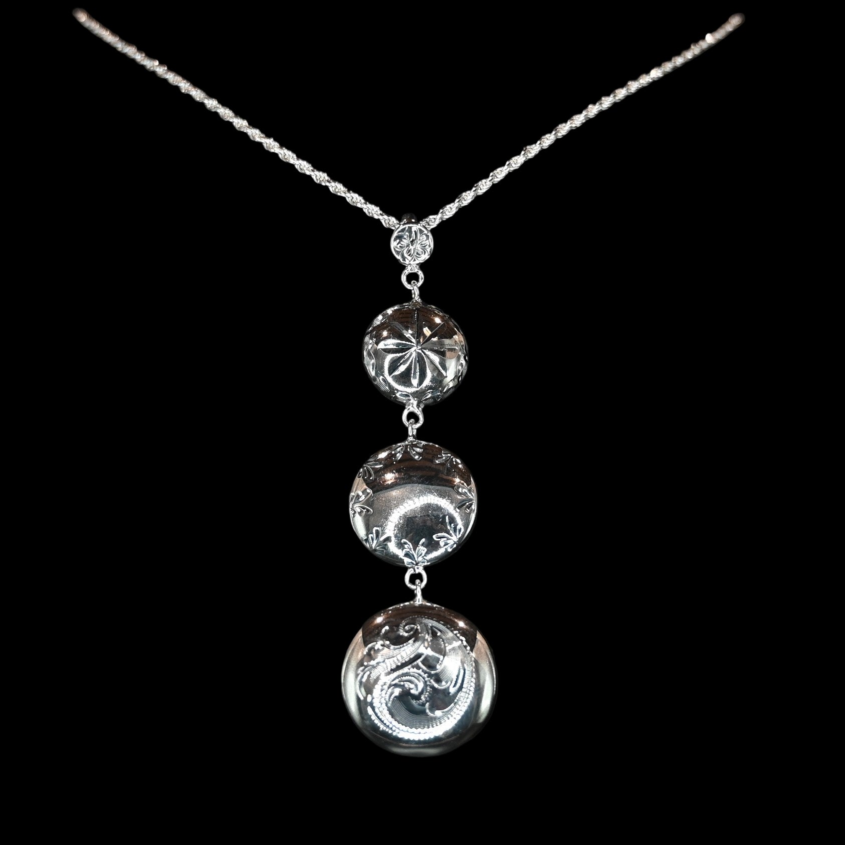 Vogt Silversmiths Kimberly Going Out pendant, sterling silver with three engraved conchos