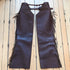View of K Bar J Cowboy Basic Shotgun Chaps in Size Medium with fringe and buckle closures