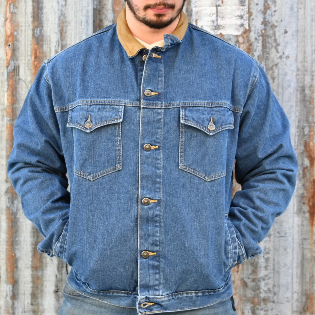 View of Schaefer unlined denim jackets in Indigo, Saddle, Tan, Olive, and Natural with Western yoke and four-pocket front