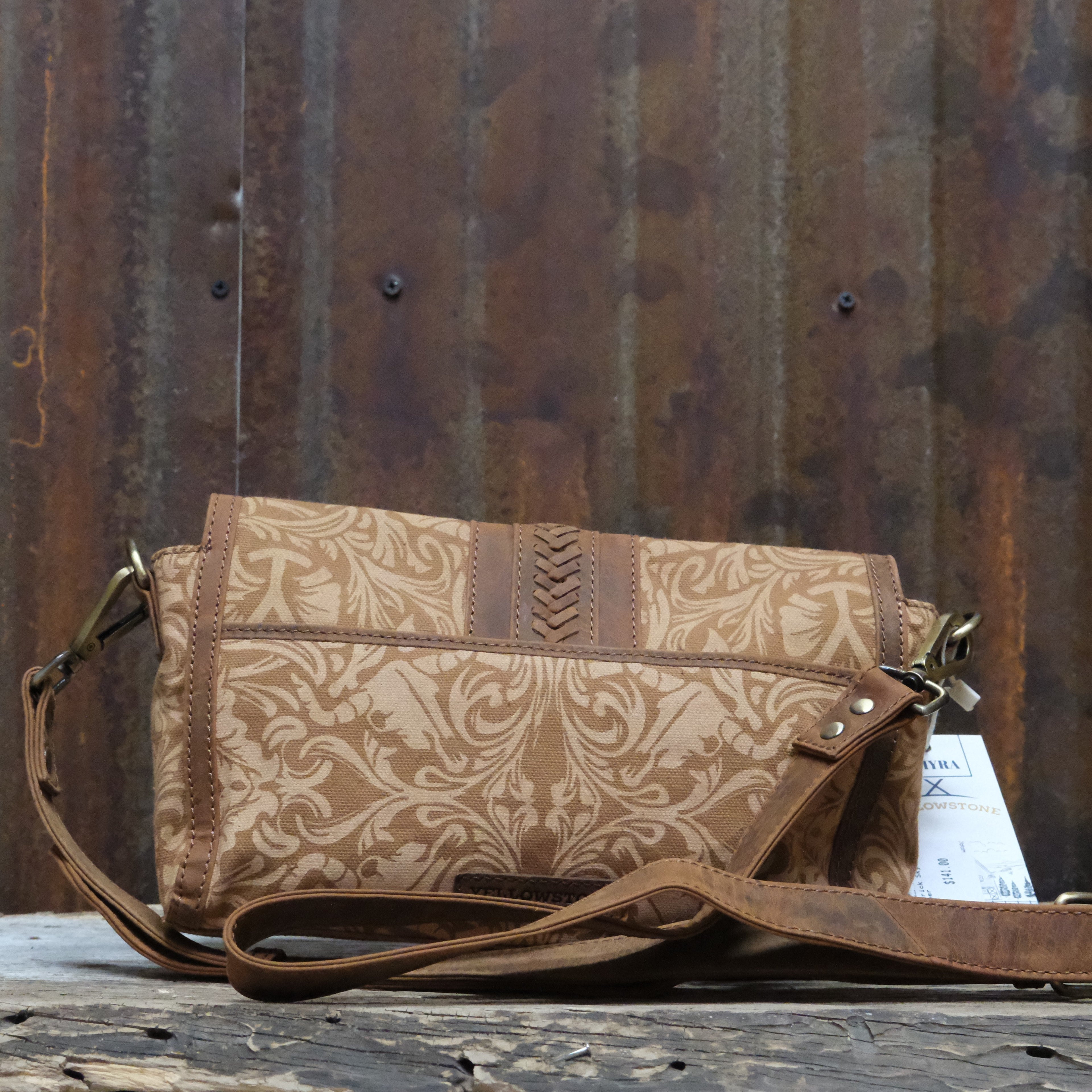 Myra Yellowstone Maverick Sky printed canvas crossbody bag in amber with buckle and leather trim