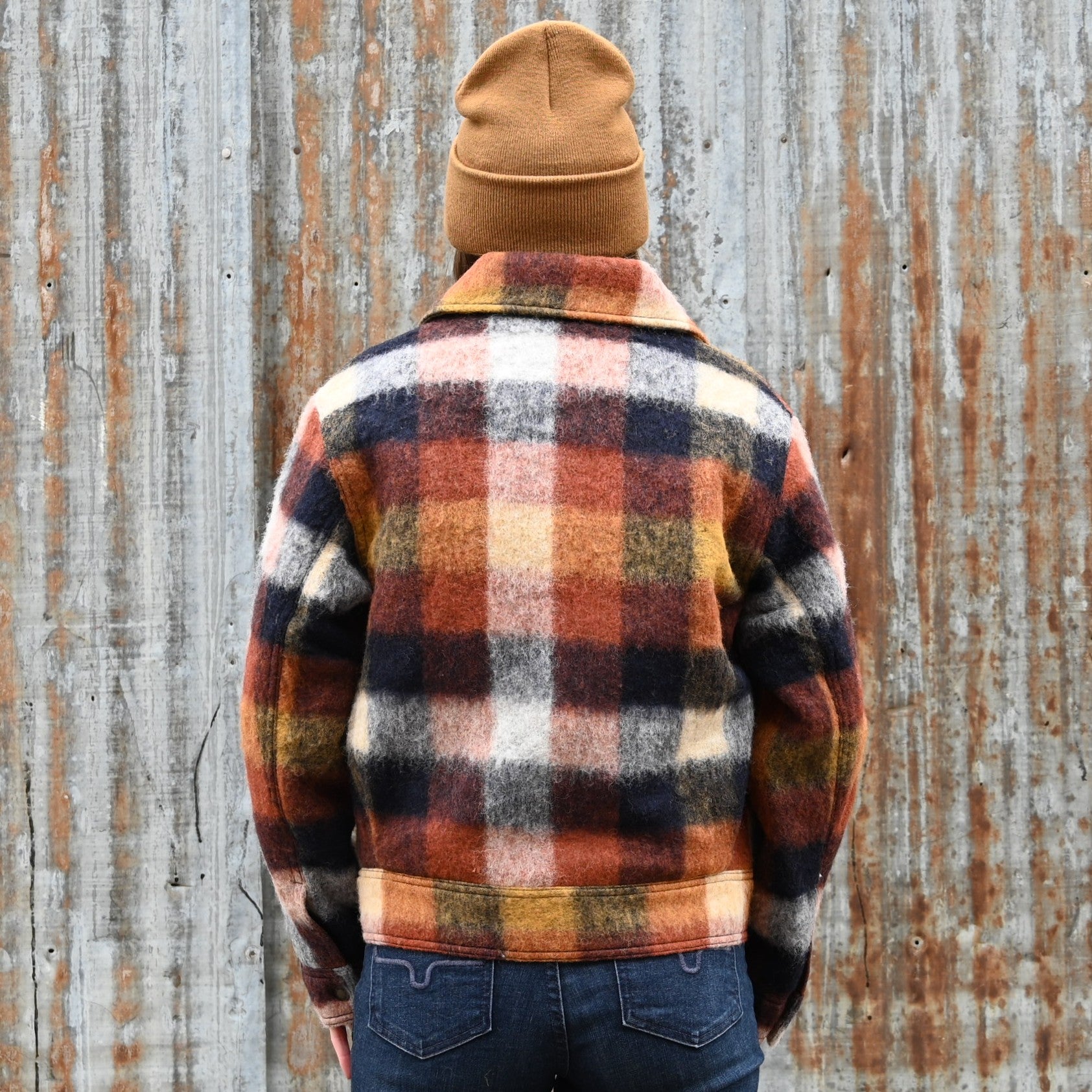 Filson Ladies Blanket Wool Heritage Jacket in red, orange, and black plaid with snap-front design