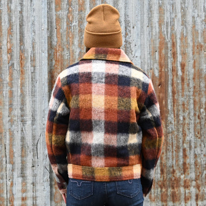 Filson Ladies Blanket Wool Heritage Jacket in red, orange, and black plaid with snap-front design