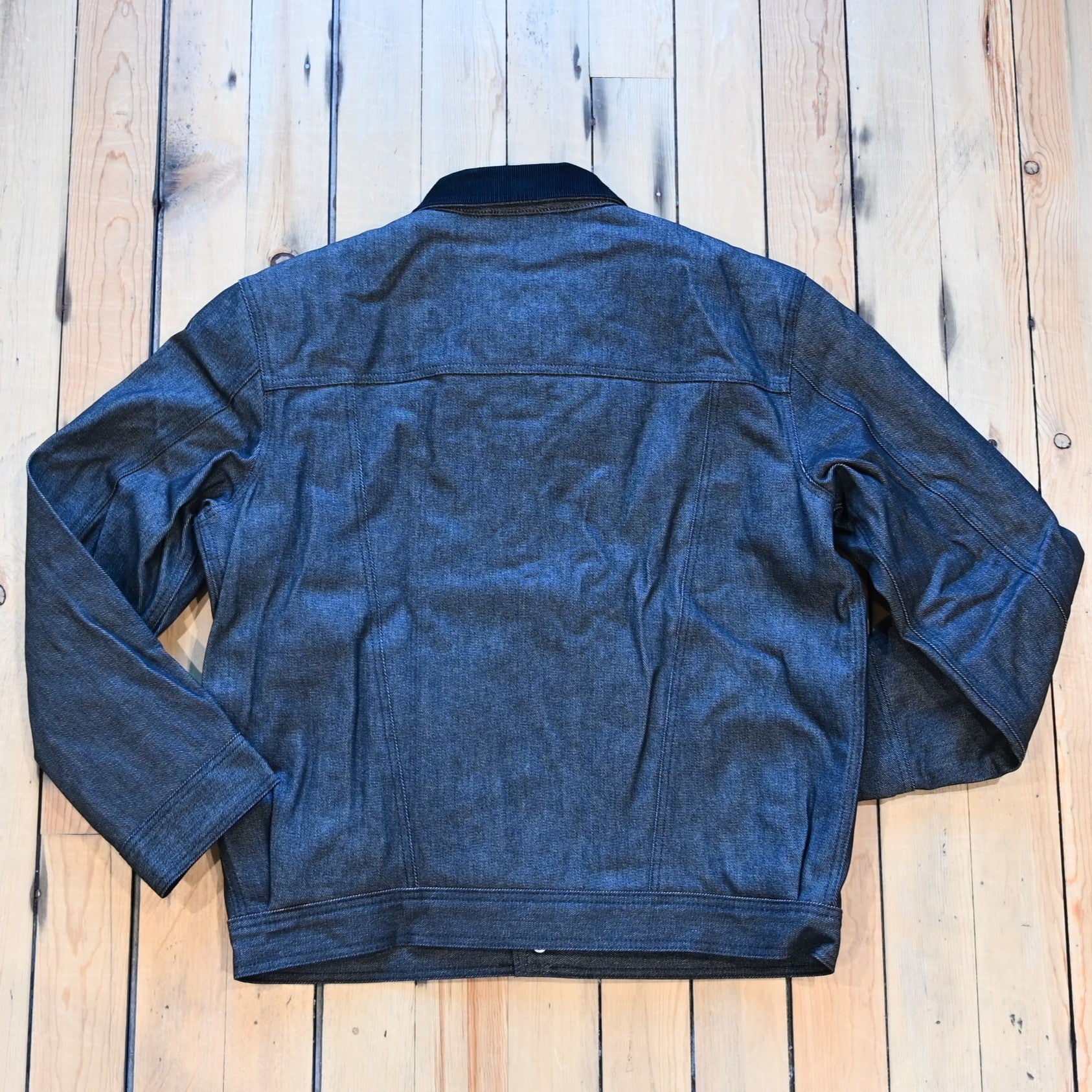 Filson × Wrangler black denim work jacket, sherpa lined with snap front and corduroy collar