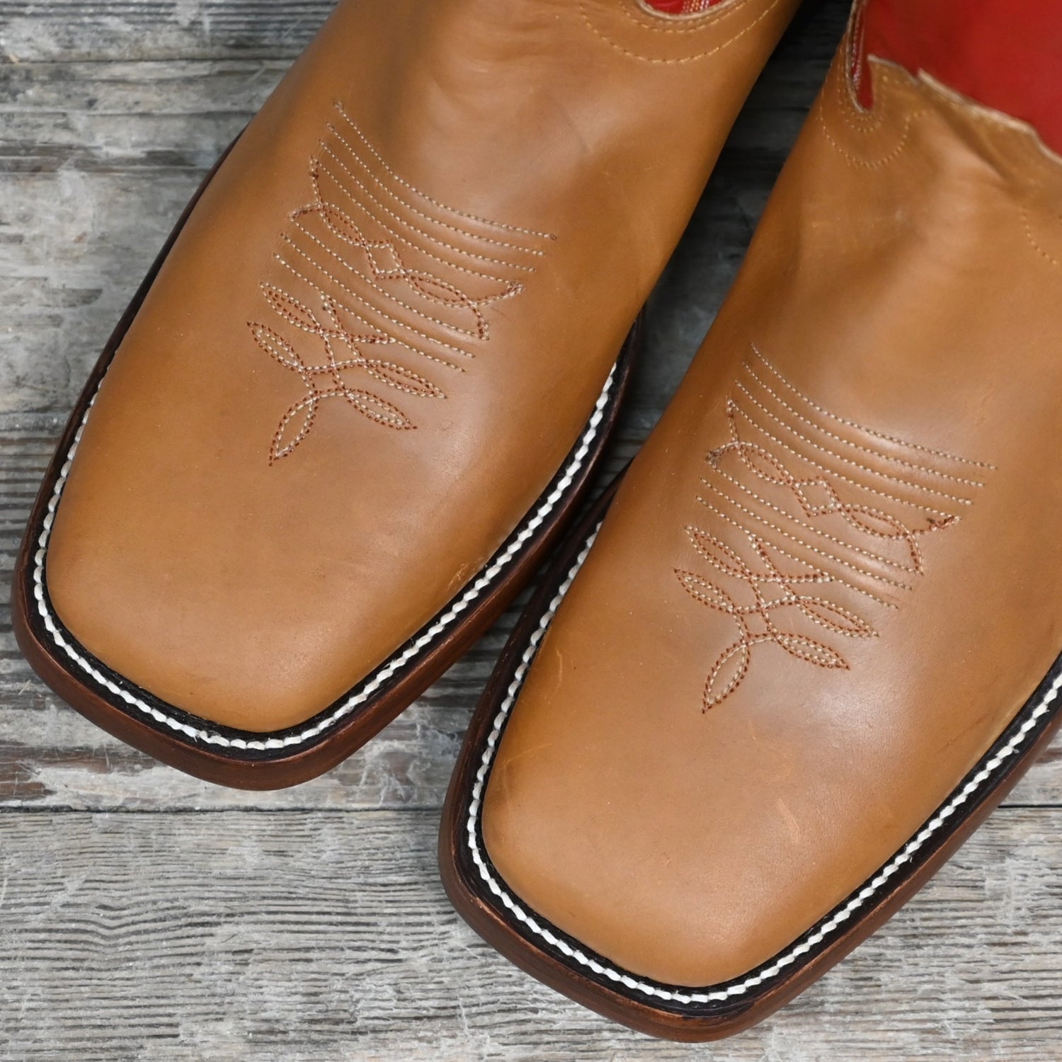 View of Hondo 16&quot; cowboy boot with red top, honey crazy horse vamp, wide square toe, pull holes, and spur ledge