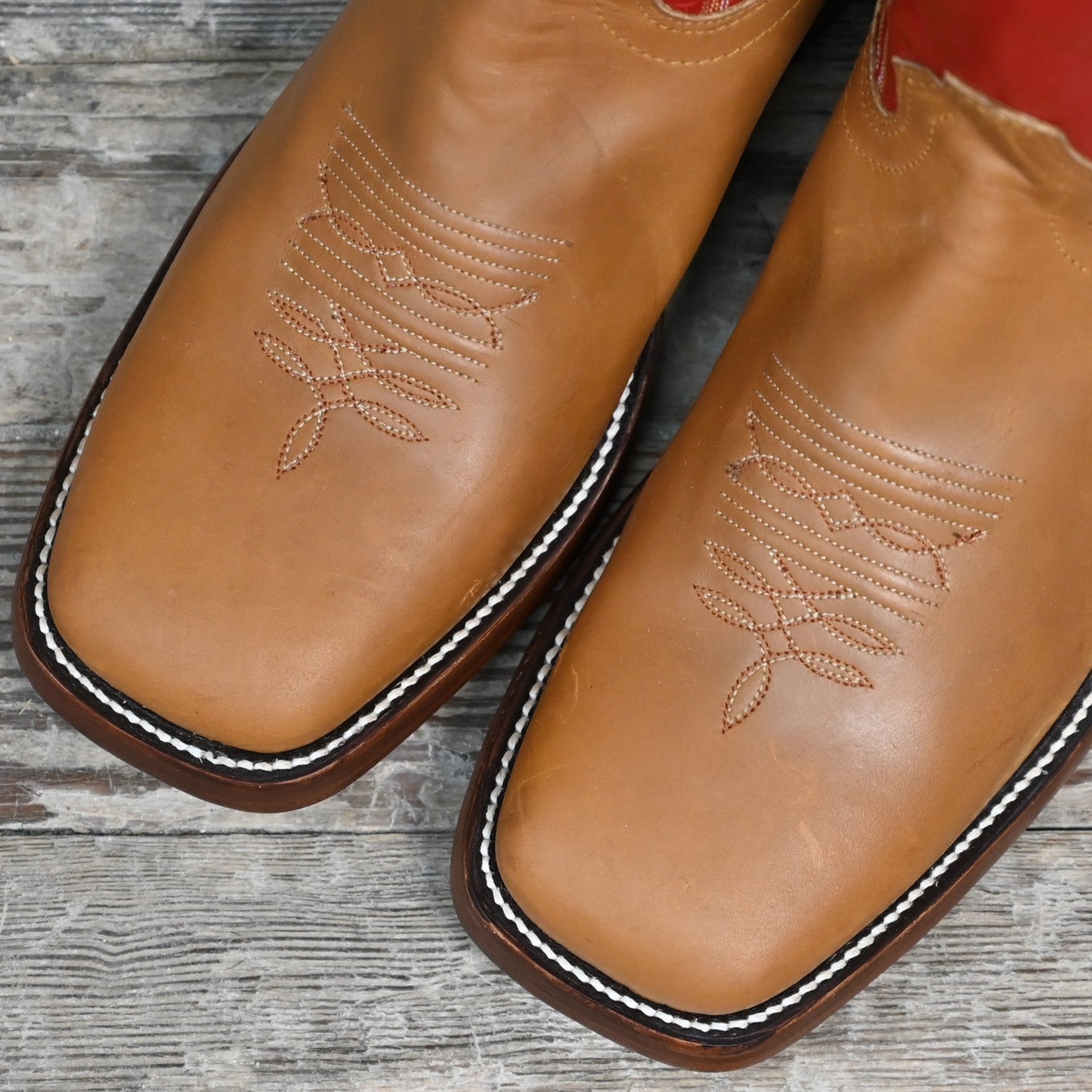 View of Hondo 16&quot; cowboy boot with red top, honey crazy horse vamp, wide square toe, pull holes, and spur ledge