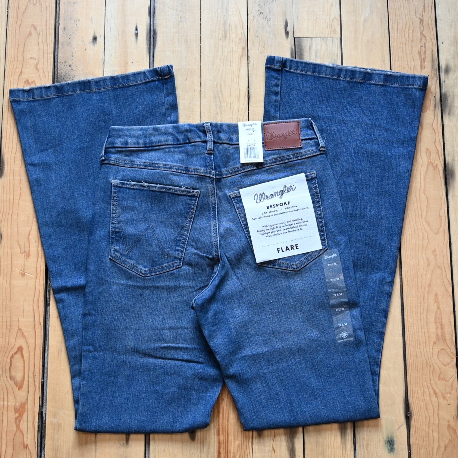 View of Wrangler Ladies flare jeans in Lily wash with high-rise waist and slim fit from the Bespoke Collection