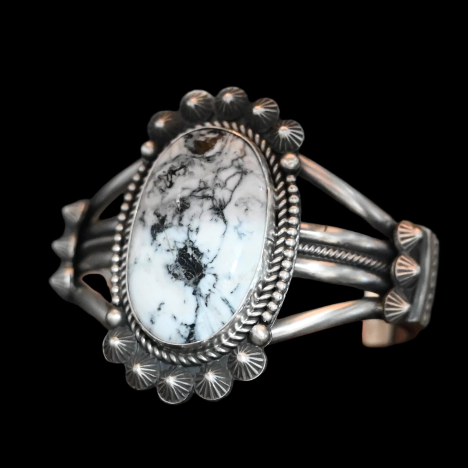 View of Sunwest Silver Michael Calladitto White Buffalo Cuff featuring a large White Buffalo stone with intricate sterling silver detailing