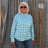 View of Schaefer blue & green plaid Range Tek shirt with snap front and mesh back vent