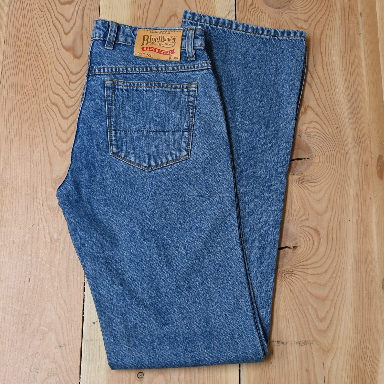 View of Blue Blanket ladies light indigo denim jeans with straight-leg silhouette and tailored waist