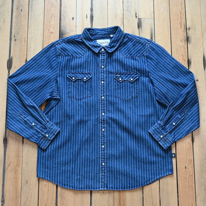 Howler Bros Dust Up Denim Snapshirt in Merle Stripe with pearl snaps and Western detailing