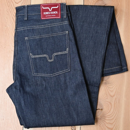 View of Kimes Ranch Raw James Jeans in Dark Indigo featuring integrated knife pocket and light stitching details.