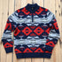 View of Pendleton men’s Nehalem lambswool ¼‑zip sweater in navy and red with geometric pattern