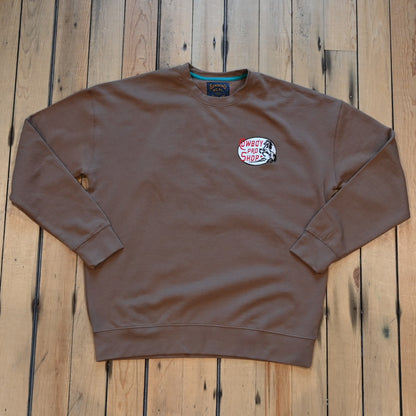 Crewneck sweatshirt with “Cowboy Pro Shop” and horse silhouette graphic in Western style