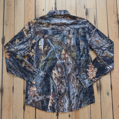 Sendero Confluence Tech Long Sleeve Shirt in Will Tree Camo featuring classic pearl snaps and a tailored western fit.